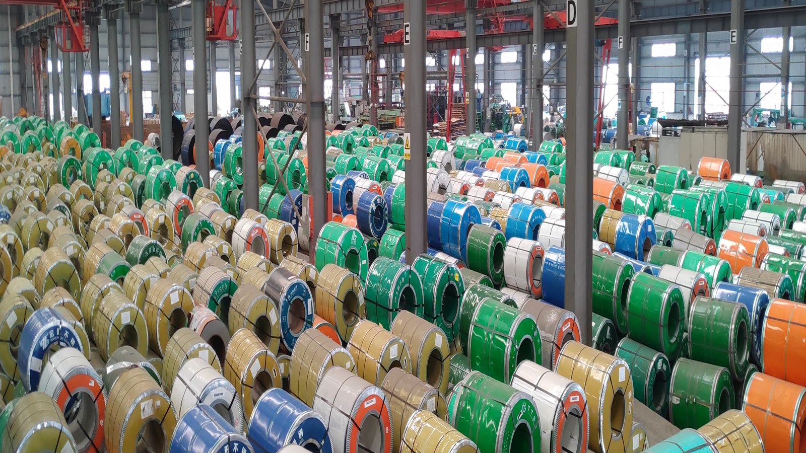 Stainless steel coil inventory with labels for heat number traceability