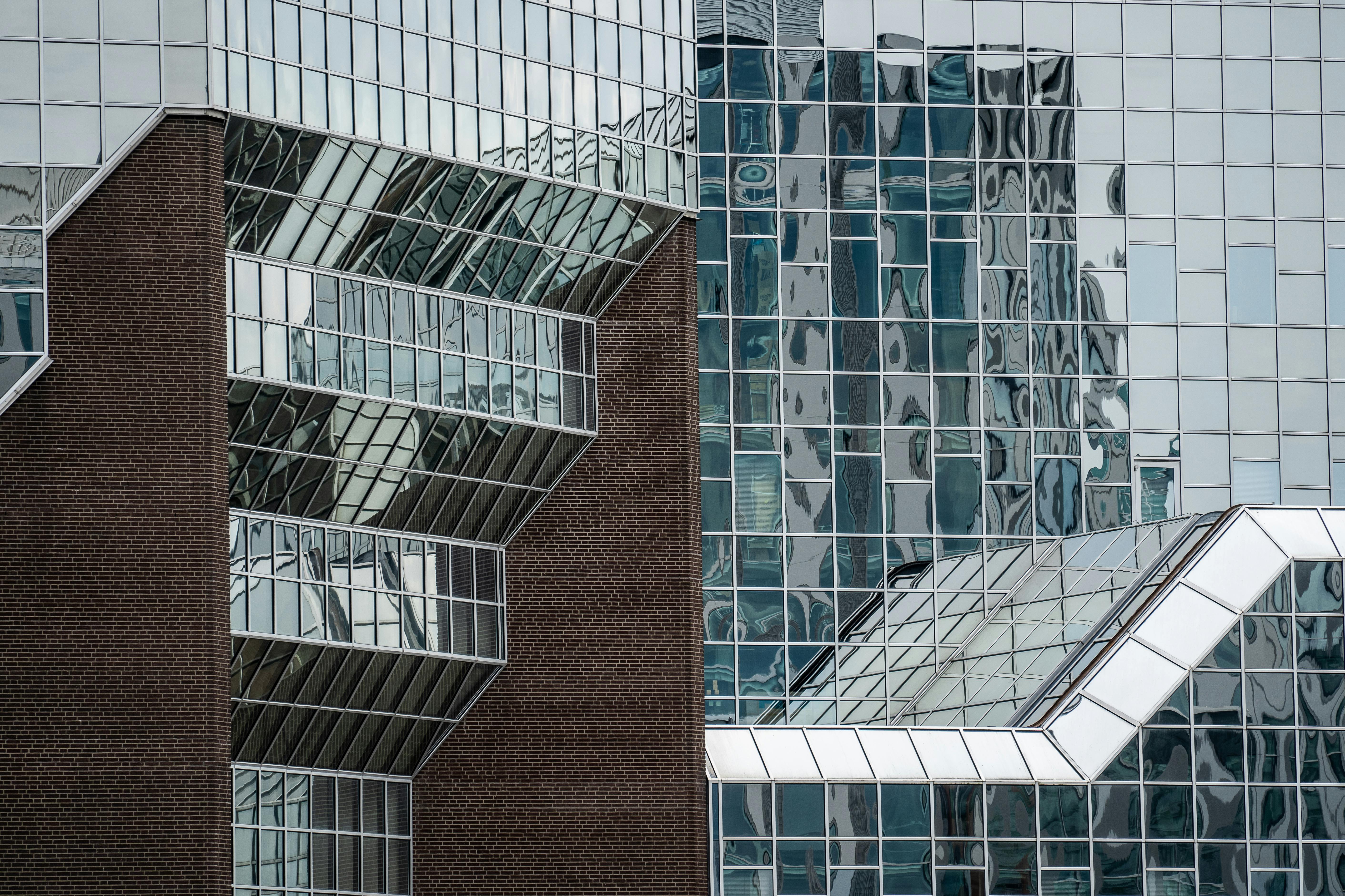 Modern glass building exterior for Jinling Metals office visit contact