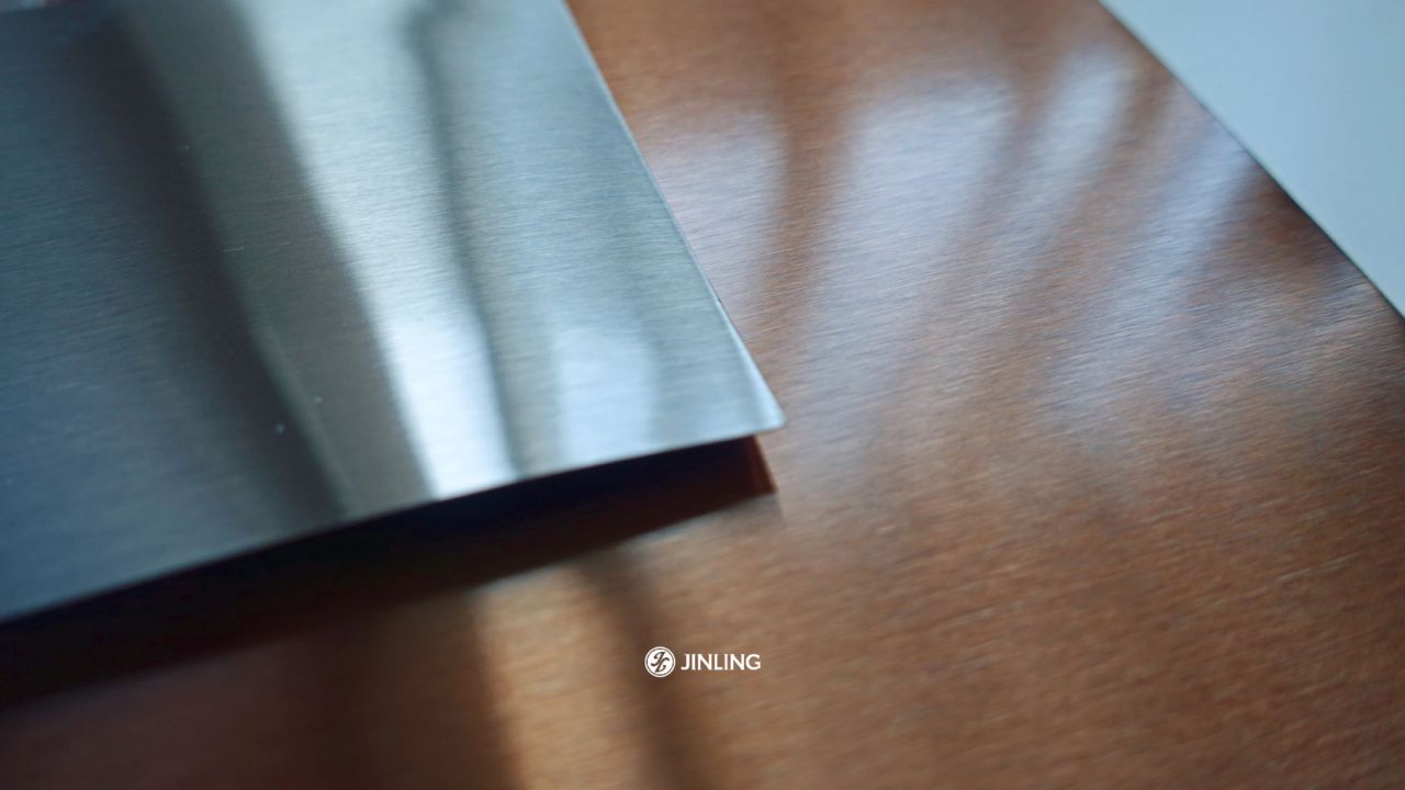 AFP brushed stainless steel sample reflecting wood grain surface