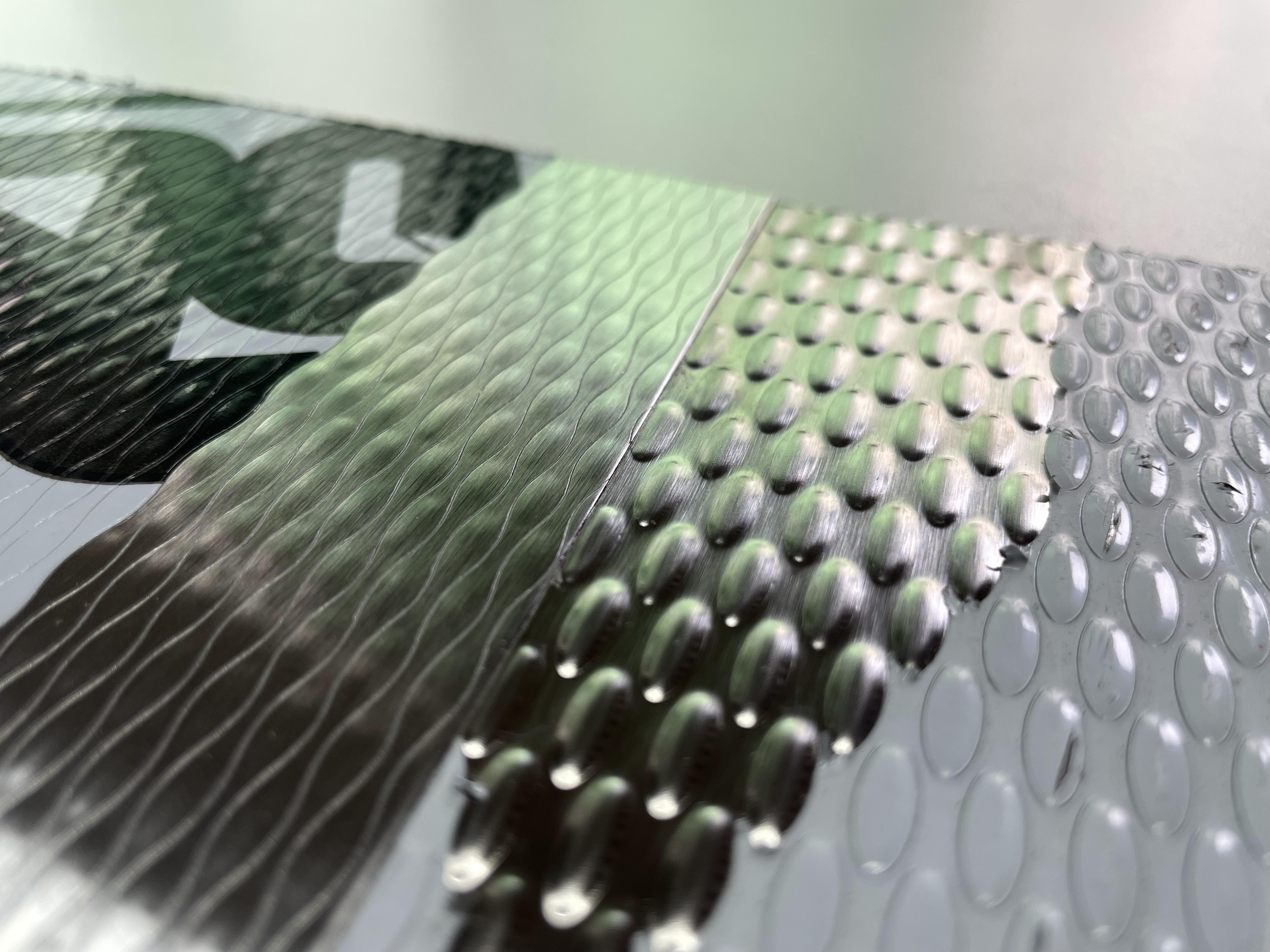 Embossed decorative stainless steel sheet finish